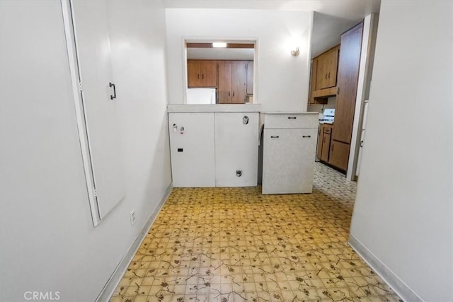 13411 Wingo St, Arleta, CA 91331 - hallway with light flooring and baseboards