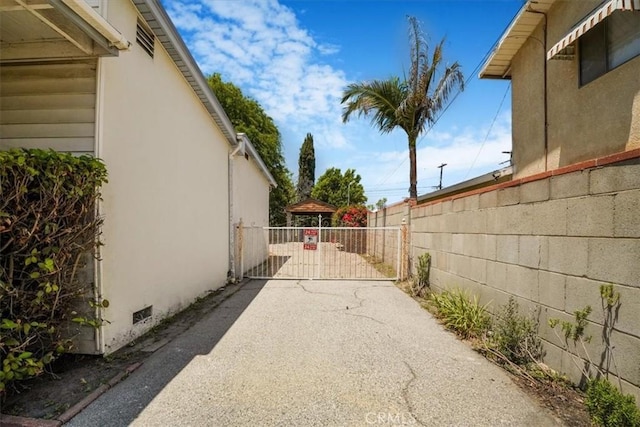 13411 Wingo St, Arleta, CA 91331 - view of property exterior featuring a gate and stucco siding
