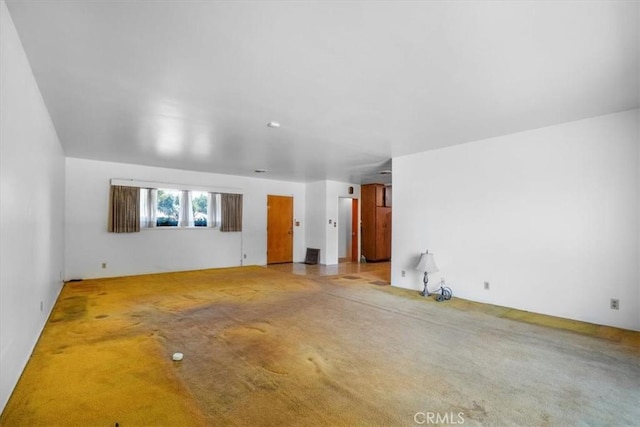 13411 Wingo St, Arleta, CA 91331 - unfurnished living room featuring carpet floors