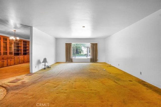 13411 Wingo St, Arleta, CA 91331 - carpeted empty room featuring a chandelier