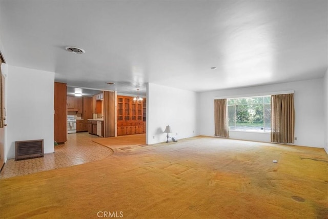 13411 Wingo St, Arleta, CA 91331 - unfurnished living room with a chandelier