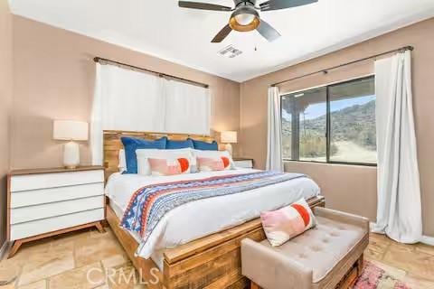 62398 Cope Ln, Joshua Tree, CA 92252 - bedroom featuring baseboards and a ceiling fan