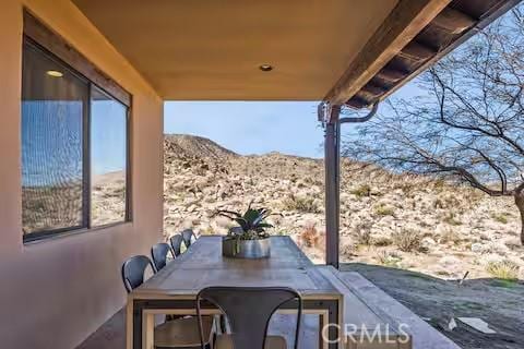 62398 Cope Ln, Joshua Tree, CA 92252 - view of patio featuring a mountain view