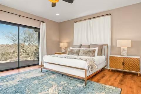 62398 Cope Ln, Joshua Tree, CA 92252 - bedroom with access to exterior, wood finished floors, ceiling fan, and recessed lighting