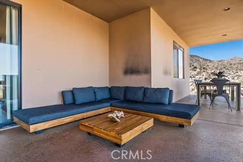 62398 Cope Ln, Joshua Tree, CA 92252 - view of patio featuring outdoor lounge area, outdoor dining area, and a mountain view