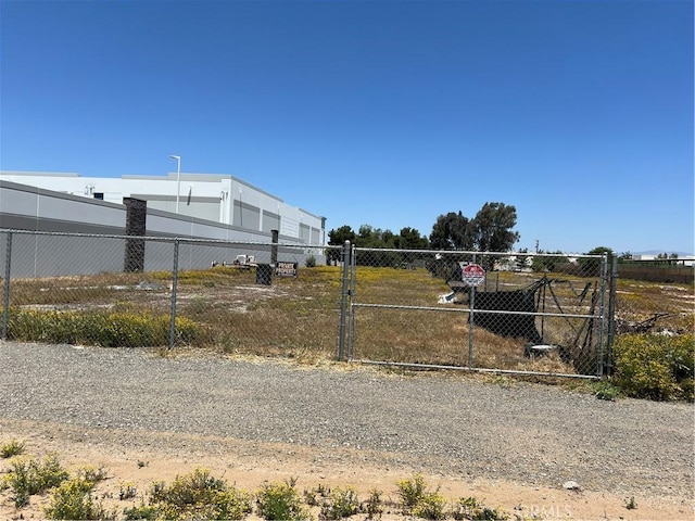 111 W Perry St, Perris, CA 92571 - view of yard with a gate