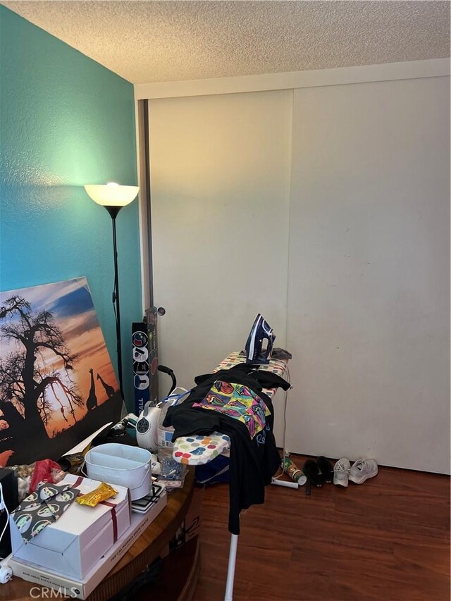 111 W Perry St, Perris, CA 92571 - office with wood finished floors and a textured ceiling