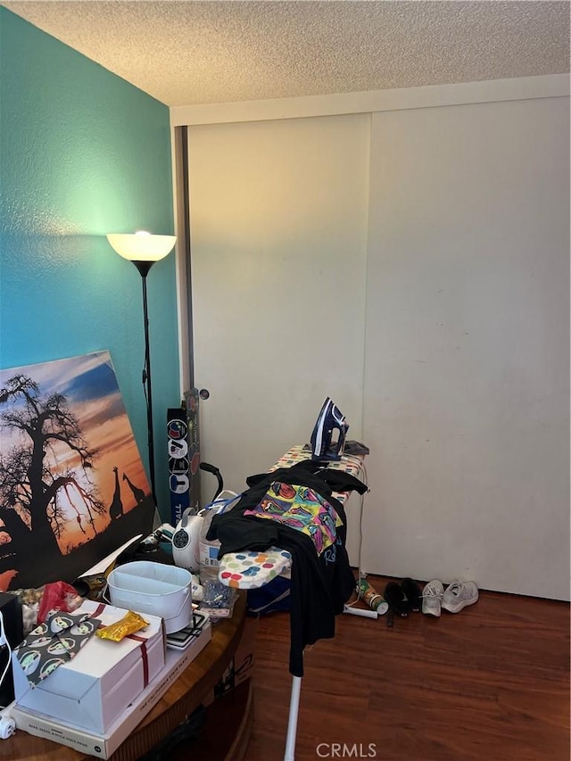 111 W Perry St, Perris, CA 92571 - office featuring wood finished floors and a textured ceiling