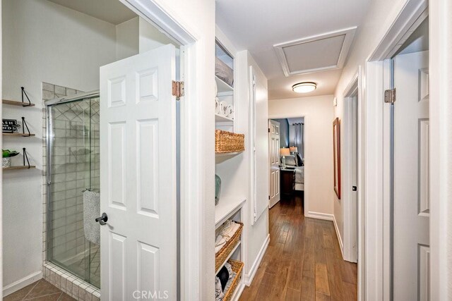 22206 Claibourne Ln, Saugus, CA 91350 - corridor featuring baseboards and dark wood-style floors