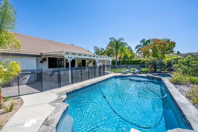 22206 Claibourne Ln, Saugus, CA 91350 - view of pool featuring a patio and a pool with connected hot tub