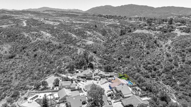 22206 Claibourne Ln, Saugus, CA 91350 - drone / aerial view of mountains and a forest