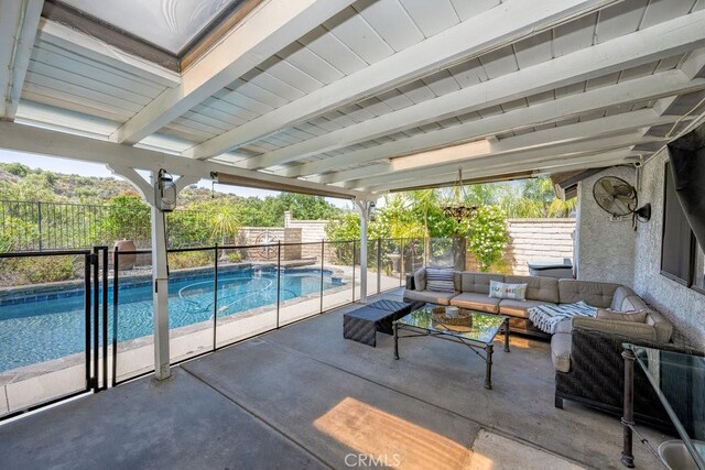 22206 Claibourne Ln, Saugus, CA 91350 - fenced backyard with outdoor lounge area and a patio area