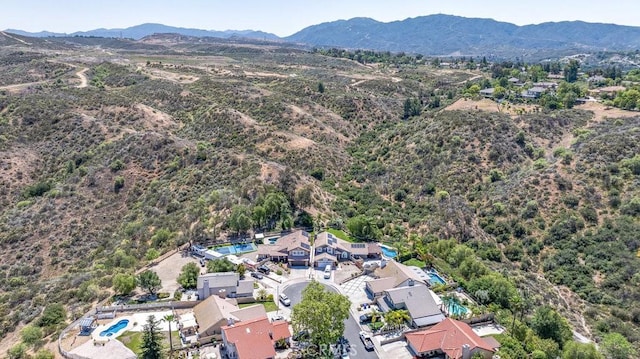 22206 Claibourne Ln, Saugus, CA 91350 - aerial view of property's location with a mountain backdrop