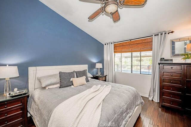 22206 Claibourne Ln, Saugus, CA 91350 - bedroom with lofted ceiling, dark wood finished floors, and a ceiling fan