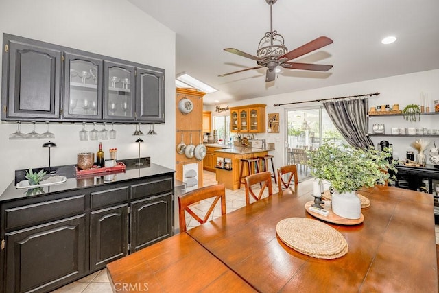 22206 Claibourne Ln, Saugus, CA 91350 - dining area featuring ceiling fan, light tile patterned floors, and recessed lighting