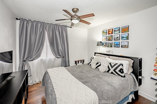 22206 Claibourne Ln, Saugus, CA 91350 - bedroom featuring dark wood-style floors, ceiling fan, and baseboards
