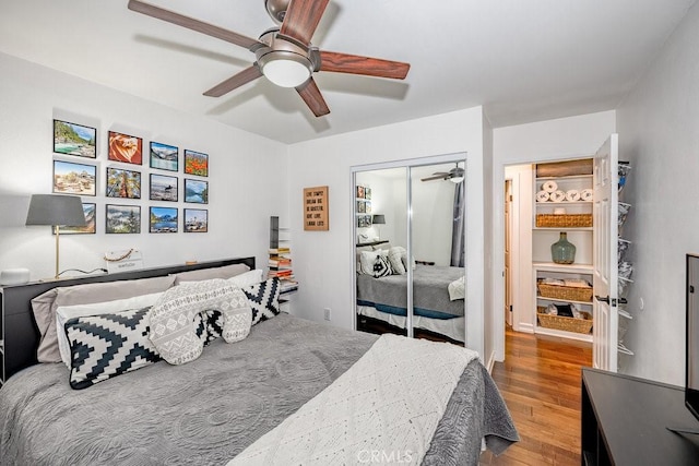 22206 Claibourne Ln, Saugus, CA 91350 - bedroom with wood finished floors, a closet, and a ceiling fan
