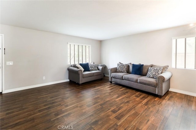 28926 Lavatera Ave, Murrieta, CA 92563 - living area featuring dark wood-style floors and baseboards