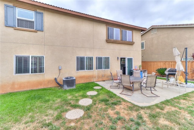 28926 Lavatera Ave, Murrieta, CA 92563 - back of property featuring a patio, stucco siding, and cooling unit