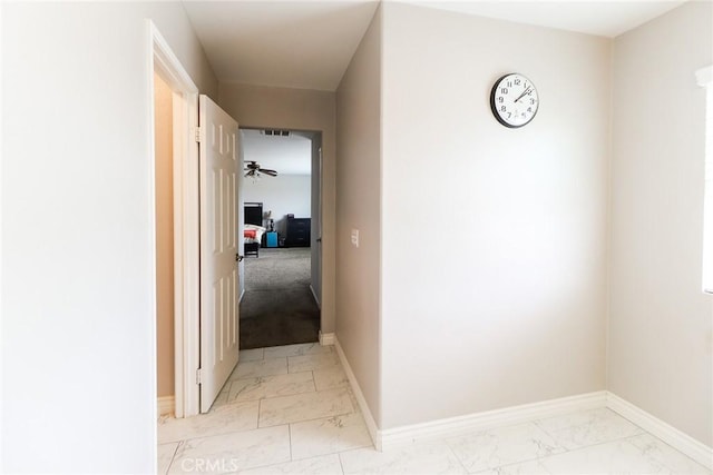 28926 Lavatera Ave, Murrieta, CA 92563 - hall featuring light marble finish floors and baseboards