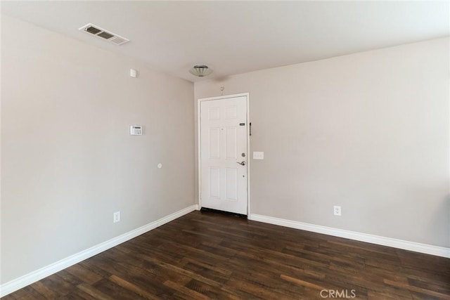 28926 Lavatera Ave, Murrieta, CA 92563 - spare room with baseboards and dark wood-type flooring