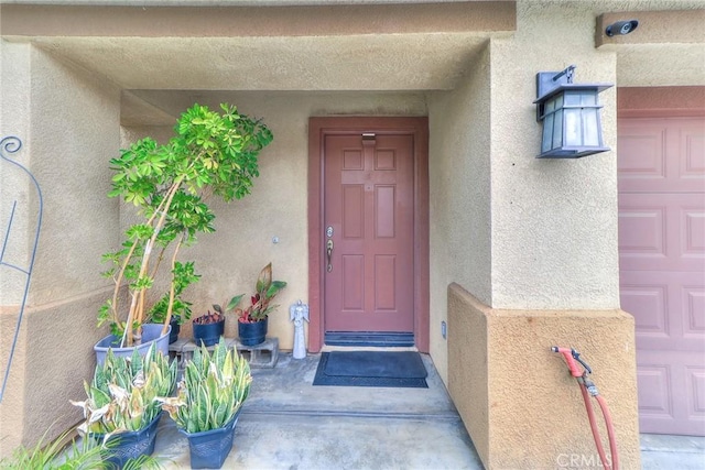 28926 Lavatera Ave, Murrieta, CA 92563 - doorway to property featuring stucco siding