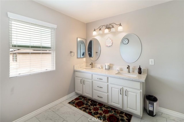 28926 Lavatera Ave, Murrieta, CA 92563 - full bathroom with marble look tile flooring, double vanity, and baseboards