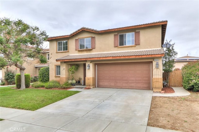 28926 Lavatera Ave, Murrieta, CA 92563 - mediterranean / spanish home featuring an attached garage, concrete driveway, stucco siding, and a tile roof