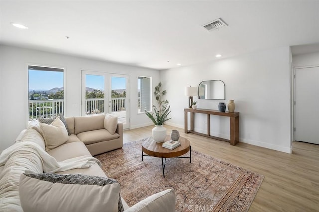 667 Hill St, San Luis Obispo, CA 93405 - living area featuring light wood-style floors, baseboards, and recessed lighting