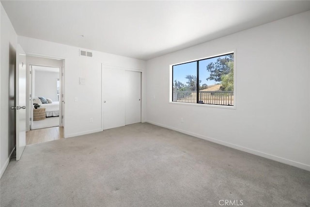 667 Hill St, San Luis Obispo, CA 93405 - unfurnished bedroom with carpet flooring and baseboards
