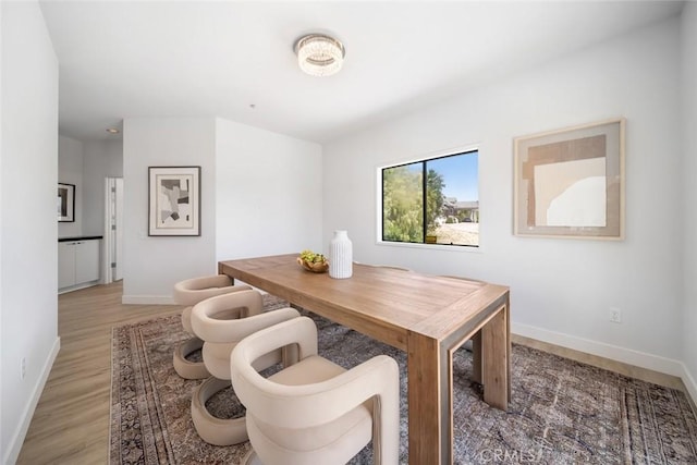 667 Hill St, San Luis Obispo, CA 93405 - dining space featuring light wood-type flooring and baseboards