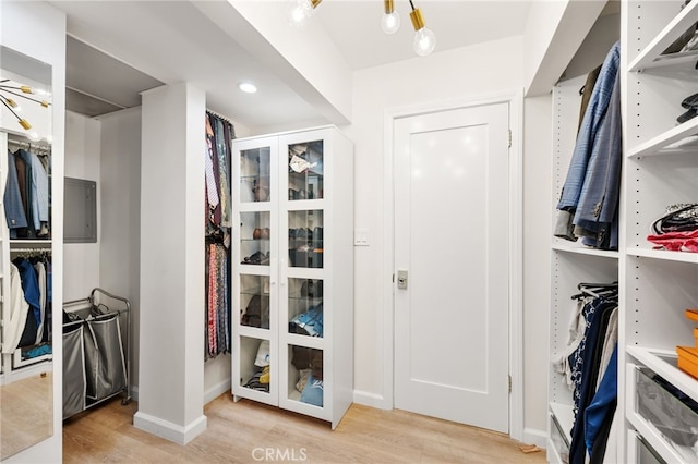 906 N Doheny Dr Unit 318, West Hollywood, CA 90069 - walk in closet featuring light wood-style floors