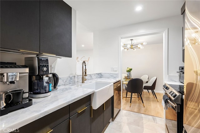 906 N Doheny Dr Unit 318, West Hollywood, CA 90069 - kitchen with black range with electric cooktop, dishwasher, dark cabinetry, a chandelier, and light stone countertops