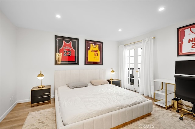 906 N Doheny Dr Unit 318, West Hollywood, CA 90069 - bedroom featuring wood finished floors, recessed lighting, a desk, and baseboards