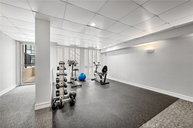 906 N Doheny Dr Unit 318, West Hollywood, CA 90069 - exercise area featuring a drop ceiling and baseboards