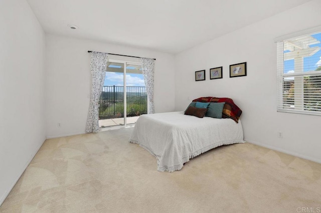 4729 Crater Rim Rd, Carlsbad, CA 92010 - carpeted bedroom with access to outside and baseboards