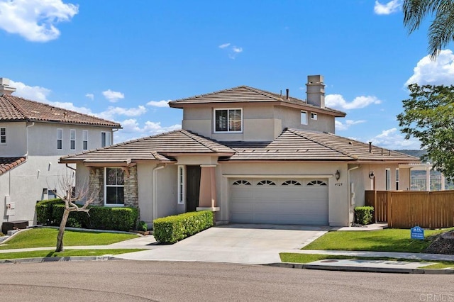 4729 Crater Rim Rd, Carlsbad, CA 92010 - traditional-style house featuring concrete driveway, an attached garage, stucco siding, a tile roof, and a chimney