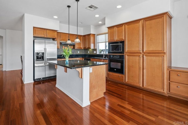 4729 Crater Rim Rd, Carlsbad, CA 92010 - kitchen with stainless steel fridge with ice dispenser, oven, built in microwave, a sink, and brown cabinets