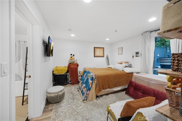 4215 Glencoe Ave Unit 103, Marina Del Rey, CA 90292 - bedroom featuring wood finished floors and recessed lighting