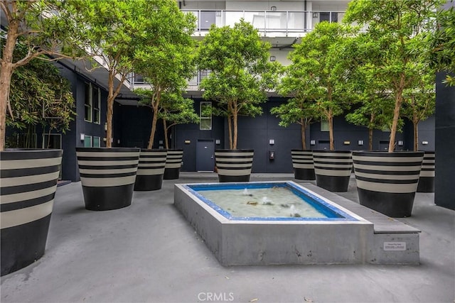4215 Glencoe Ave Unit 103, Marina Del Rey, CA 90292 - view of swimming pool featuring an outdoor hot tub