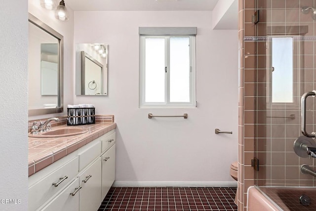 2365 Henrietta Ave, La Crescenta, CA 91214 - full bath featuring vanity, bath / shower combo with glass door, baseboards, and toilet
