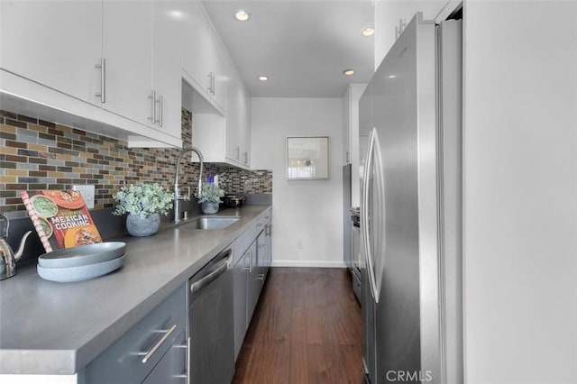 1914 Corinth Ave Unit 201, Los Angeles, CA 90025 - kitchen with a sink, appliances with stainless steel finishes, dark wood finished floors, recessed lighting, and white cabinets