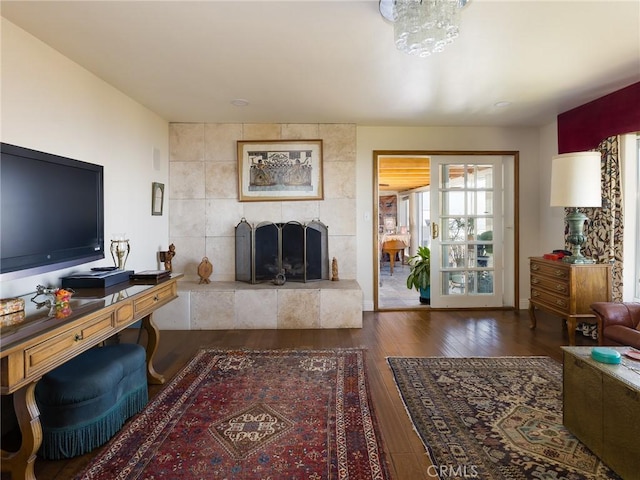 30040 Grandpoint Ln, Rancho Palos Verdes, CA 90275 - living room featuring wood-type flooring, a tile fireplace, and a desk