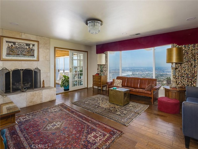 30040 Grandpoint Ln, Rancho Palos Verdes, CA 90275 - living room with hardwood / wood-style flooring and a tile fireplace