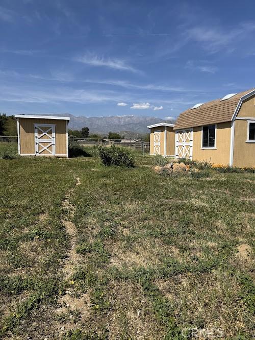 1447 W Westward Ave, Banning, CA 92220 - view of yard featuring a mountain view