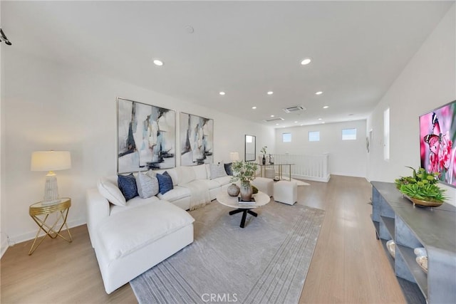 119 Zawn, Irvine, CA 92618 - living area with wood finished floors and recessed lighting