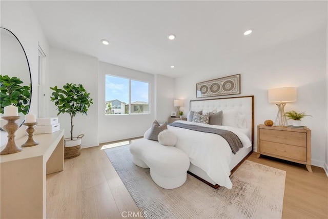119 Zawn, Irvine, CA 92618 - bedroom featuring light wood-type flooring and recessed lighting