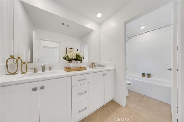 119 Zawn, Irvine, CA 92618 - bathroom featuring double vanity, toilet, tile patterned floors, shower / bathtub combination, and recessed lighting