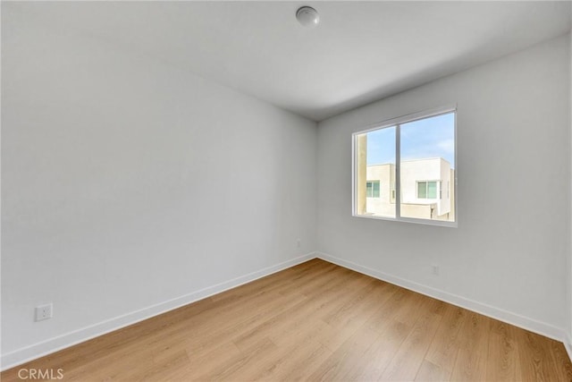 119 Zawn, Irvine, CA 92618 - spare room with light wood finished floors and baseboards