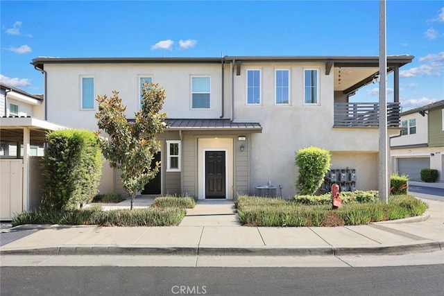 2333 S Via Esplanade Unit 25, Ontario, CA 91762 - multi unit property featuring stucco siding, a standing seam roof, and cooling unit